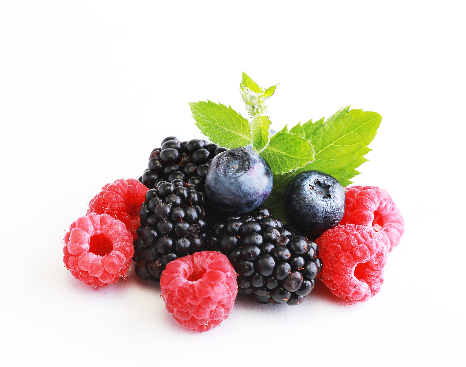 Mix berries with leaf. Various fresh berries isolated on white b Carrots. Fresh colorful carrots on white background. Flat lay top view