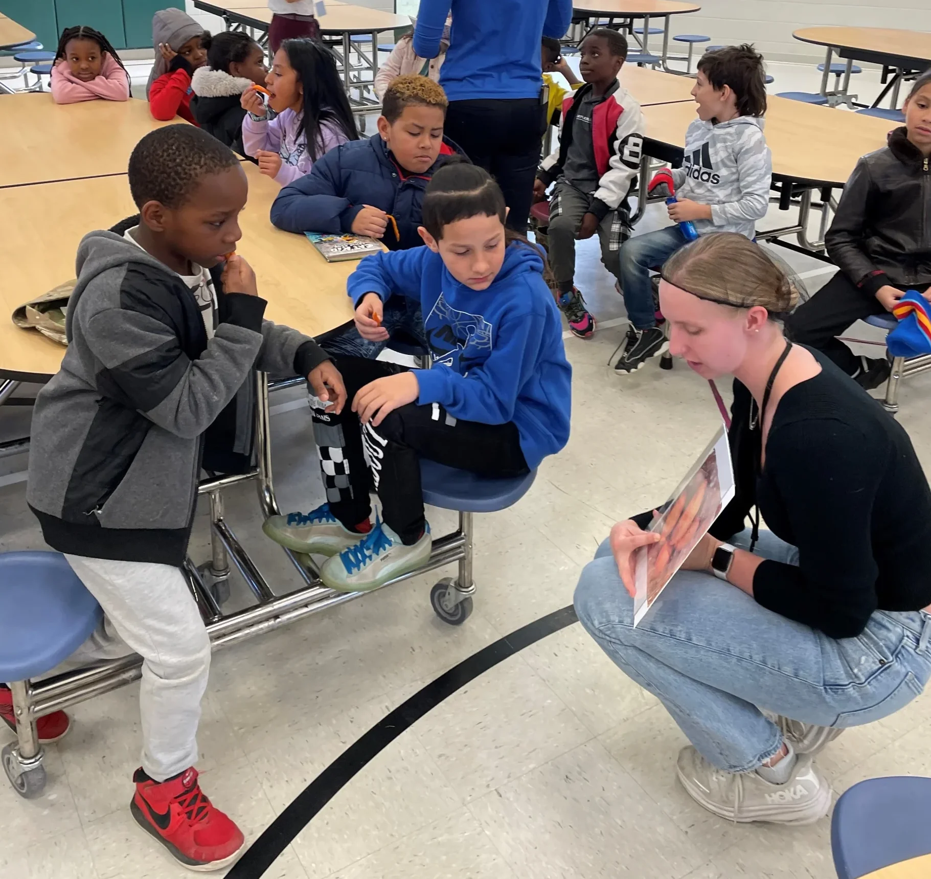 Woman teaching students about healthy nutrition